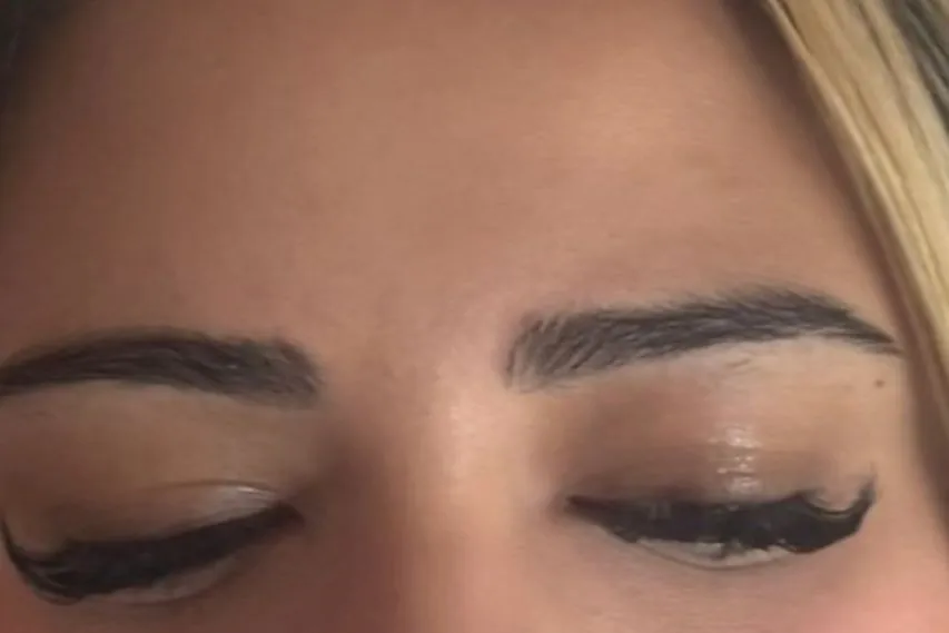 Before: client&rsquo;s natural brows, eyes closed